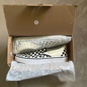Checkered slip-on vans